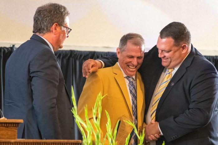 A man hand shaking with another man.